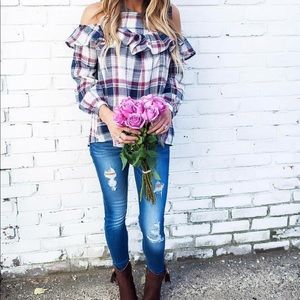 Cold shoulder flannel-like top. NWT. Size medium